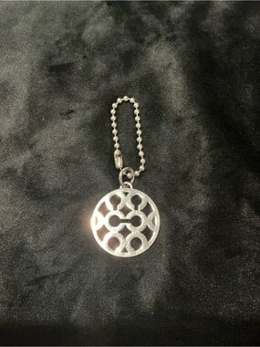 Coach Silver-Tone Round Cutout  Optic C Pendant/Hangtag